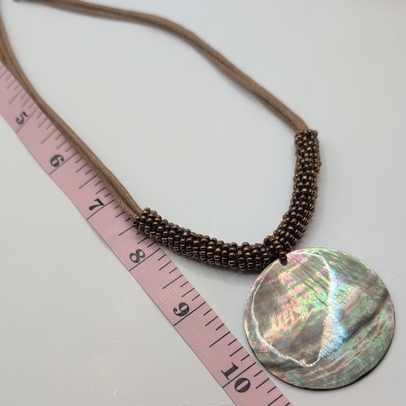 Lia Sophia Brown Necklace with Circular Shell Pendant and Earthy Tones - Picture 7 of 8